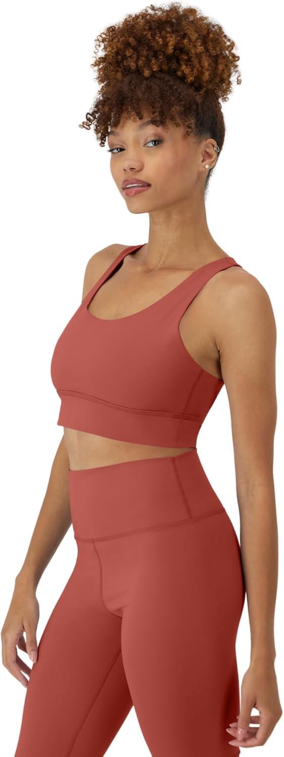 imageHanes Womens Sports Bra Moves Racerback Crop Top Yoga Bras for Women Stretch Sports Crop Top with Cutout WickingCoral Camelia