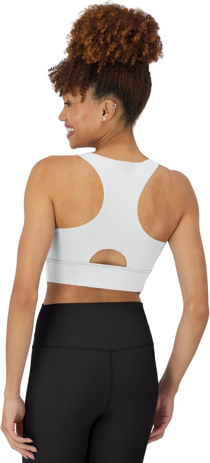 imageHanes Womens Sports Bra Moves Racerback Crop Top Yoga Bras for Women Stretch Sports Crop Top with Cutout WickingWhite